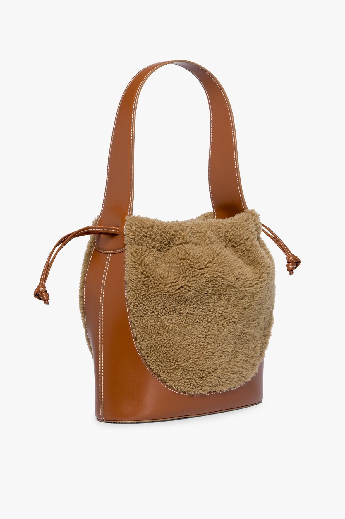 Image CINCH SHEARLING BUCKET BAG | NATURAL TAN 3 of 7 and Clicking this image will trigger a zoom pop-up