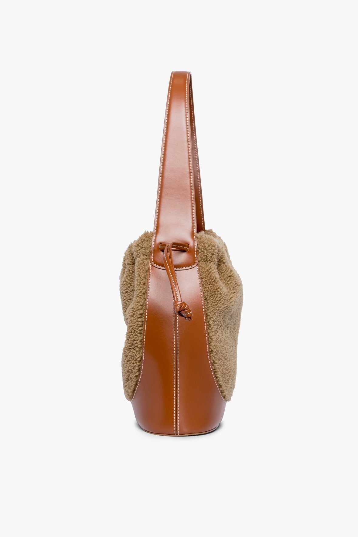 Image CINCH SHEARLING BUCKET BAG | NATURAL TAN 4 of 7 and Clicking this image will trigger a zoom pop-up